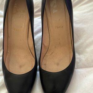 Gently worn  red soled loubiton pumps